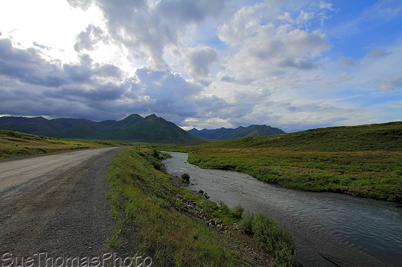 Dempster Highway in Yukon and a river beside it