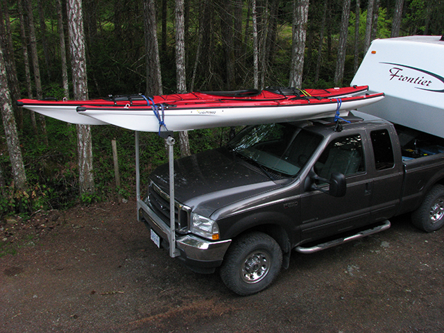 Our canoe  same rack on the front bumper and another homemade rack 