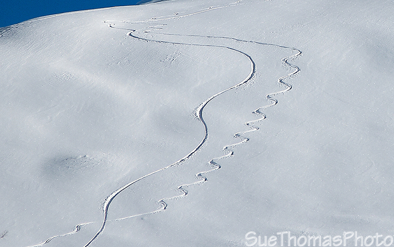 Ski and snowboard tracks on Three Guardsmen Mountain